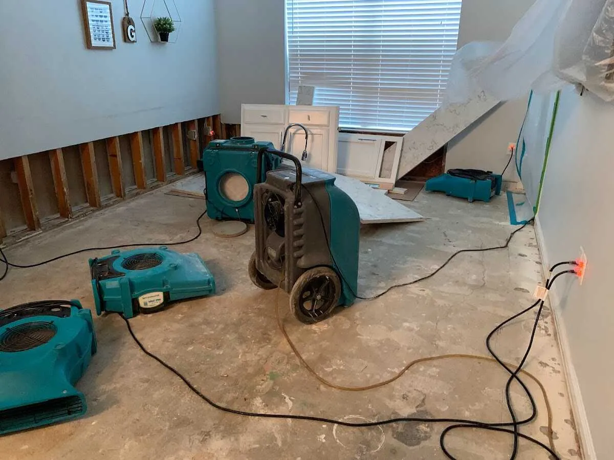 Dehumidifier in flood-cut room for Water Damage Restoration in Woodbridge
